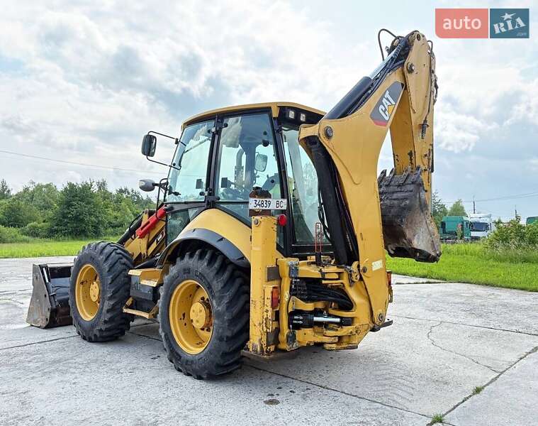 Экскаватор погрузчик Caterpillar 444 2014 в Львове