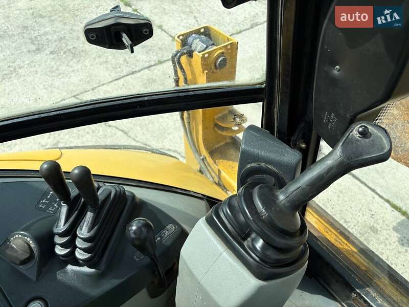 Экскаватор погрузчик Caterpillar 444 2014 в Львове