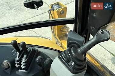 Экскаватор погрузчик Caterpillar 444 2014 в 