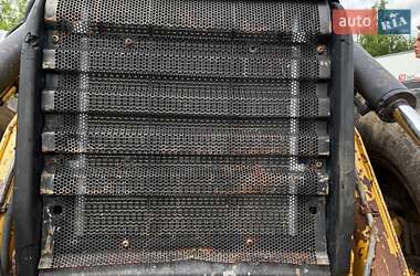 Экскаватор погрузчик Caterpillar 444 2014 в 