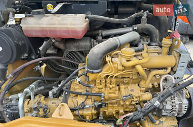 Фронтальный погрузчик Caterpillar 906 2012 в 