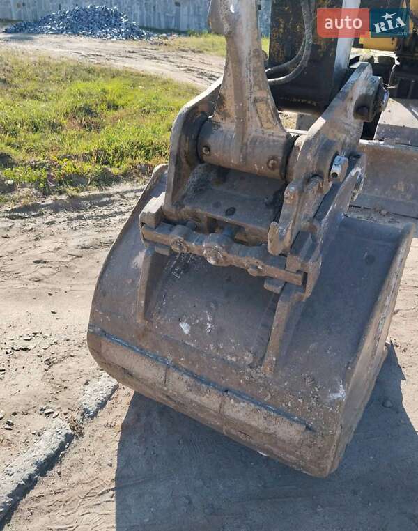 Екскаватор навантажувач Caterpillar M312 2002 в Житомирі