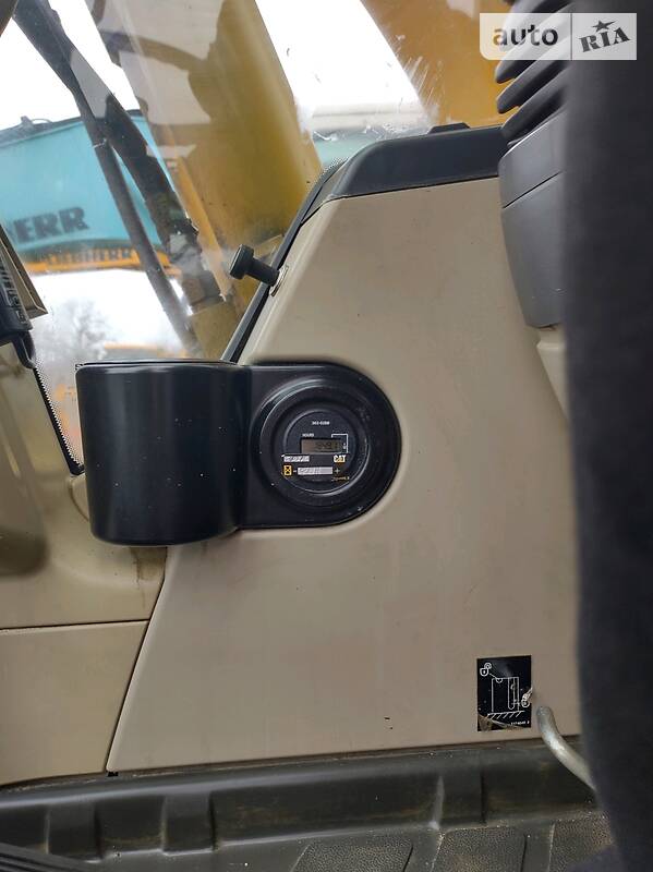 Колісний екскаватор Caterpillar M313 2006 в Рівному