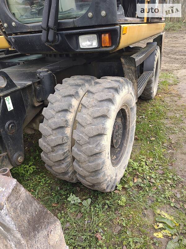 Колісний екскаватор Caterpillar M313 2006 в Рівному