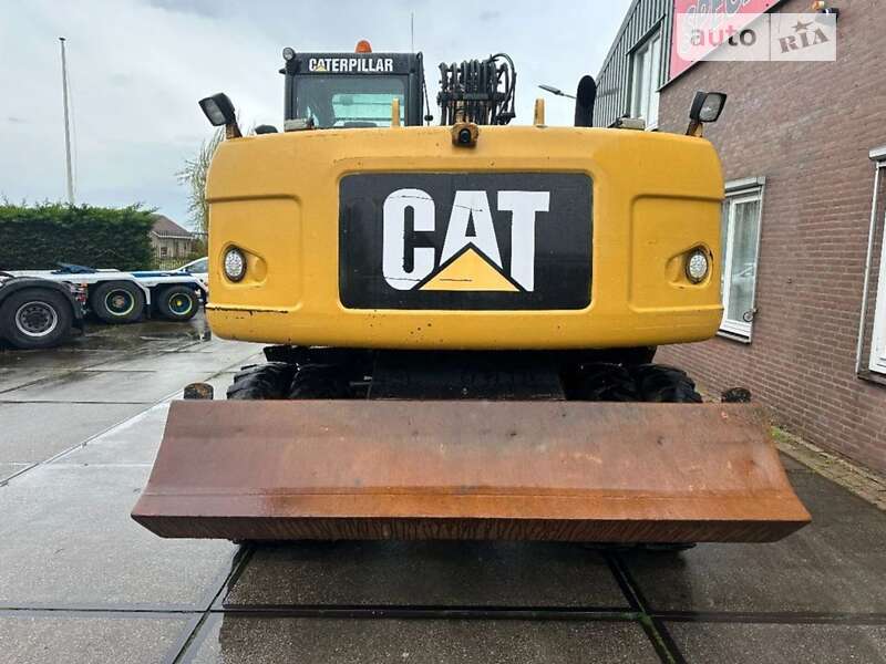 Колесный экскаватор Caterpillar M313 2008 в Луцке