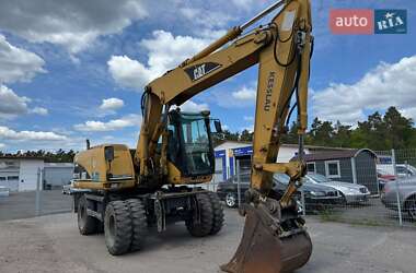 Колісний екскаватор Caterpillar M313 2004 в Луцьку