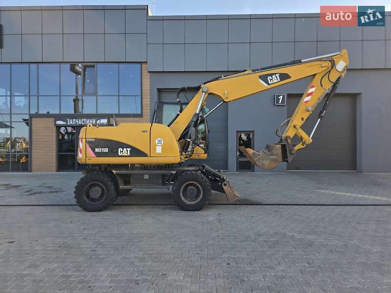 Колесный экскаватор Caterpillar M315 2009 в Ровно