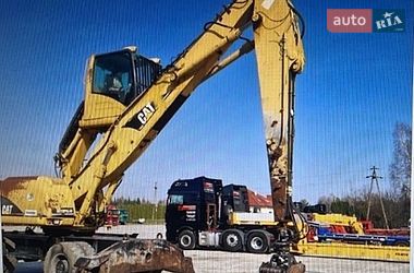 Колесный экскаватор Caterpillar M318 2005 в Косове