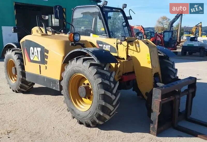 Телескопический погрузчик Caterpillar TH 2009 в 