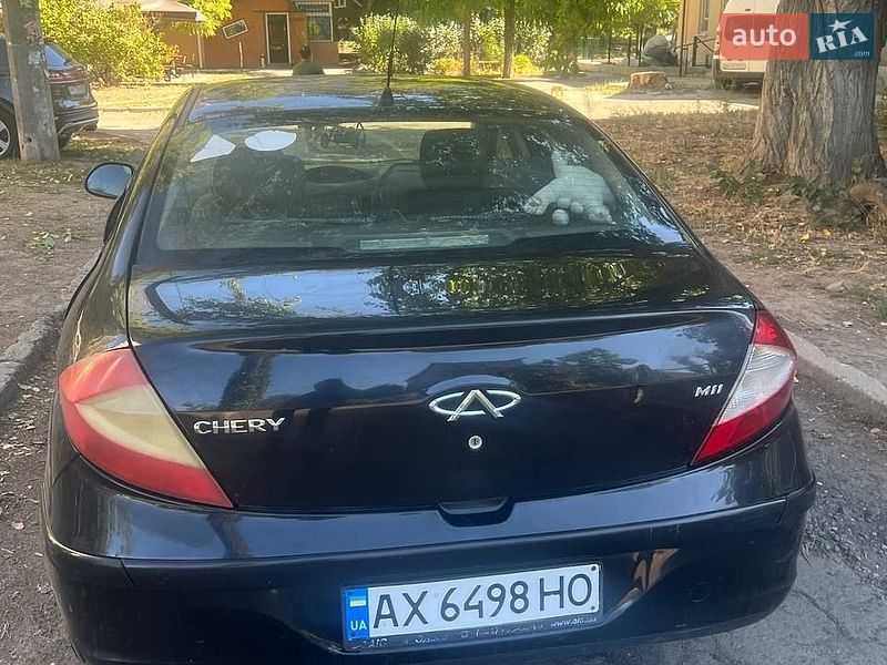 2011 Chery M11, VIN LVVDC11B2BD140647:plate — zdjęcie 1 (autoria)