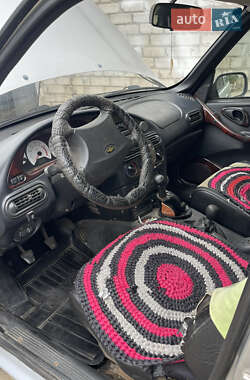 Внедорожник / Кроссовер Chevrolet Niva 2006 в  фото 2 Внедорожник / Кроссовер Chevrolet Niva 2006 в