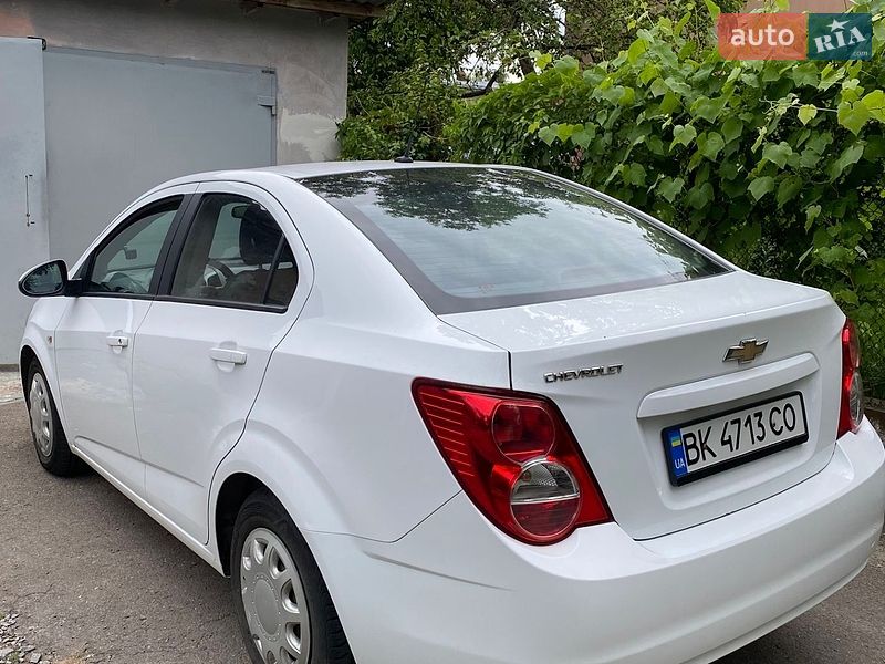 2012 Chevrolet Sonic, VIN KL1TF69G9DB023651:plate — фото 1 (autoria)