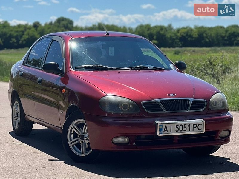 2004 Daewoo Lanos, VIN Y6DTF69YD4W216138:plate — фото 1 (autoria)