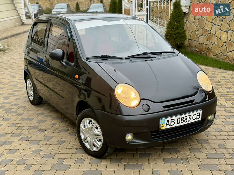 2011 Daewoo Matiz, VIN XWB4A11CDBA508346:plate — photo 1 (autoria)