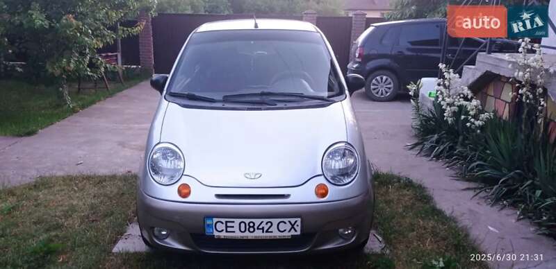 2010 Daewoo Matiz, VIN XWB4B11CDAA048394:plate — zdjęcie 1 (autoria)