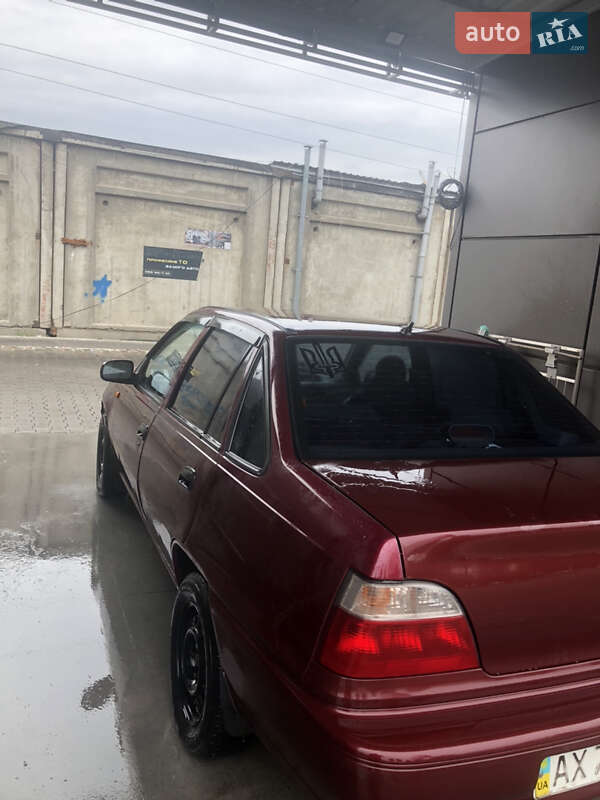 Седан Daewoo Nexia 2007 в Вишневом фото 3 Седан Daewoo Nexia 2007 в Вишневом