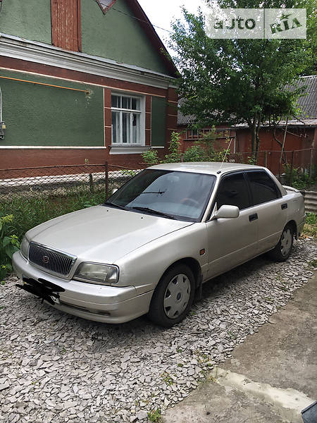 Лифтбек Daihatsu Applause 1999 в 