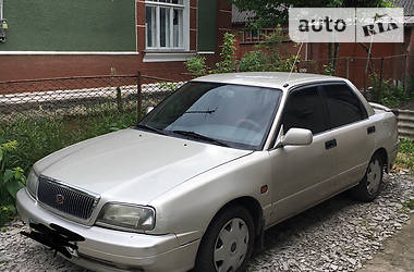 Лифтбек Daihatsu Applause 1999 в 