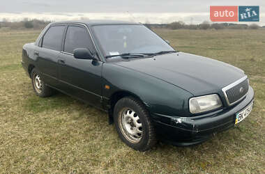 Лифтбек Daihatsu Applause 1999 в 