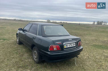 Лифтбек Daihatsu Applause 1999 в 