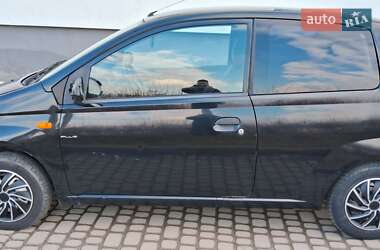 Хэтчбек Daihatsu Cuore 2004 в 