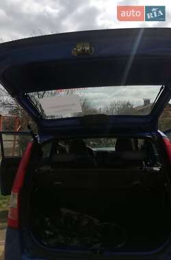 Хэтчбек Daihatsu Cuore 2003 в 