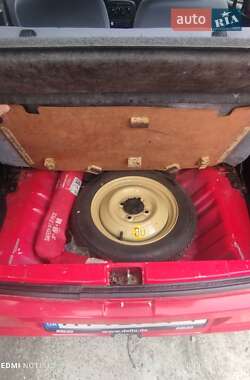 Хэтчбек Daihatsu Cuore 2004 в 