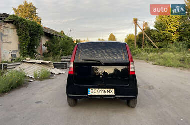 Хэтчбек Daihatsu Cuore 2004 в 