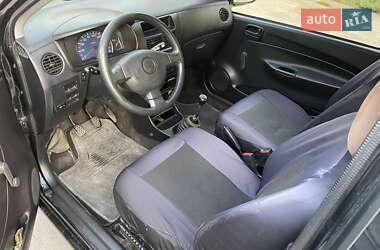 Хэтчбек Daihatsu Cuore 2004 в 