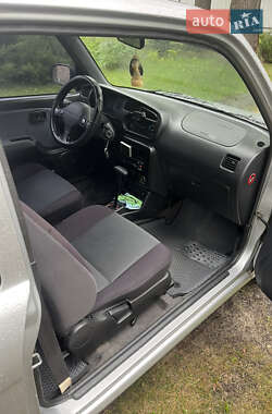 Хэтчбек Daihatsu Cuore 2003 в 
