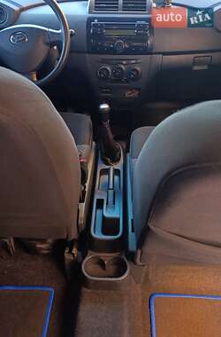 Хетчбек Daihatsu Materia 2009 в 