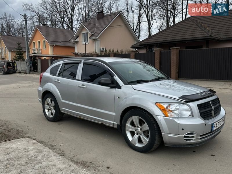 2010 Dodge Caliber, VIN 1B3CB4HAXAD664894:plate — фото 1 (autoria)