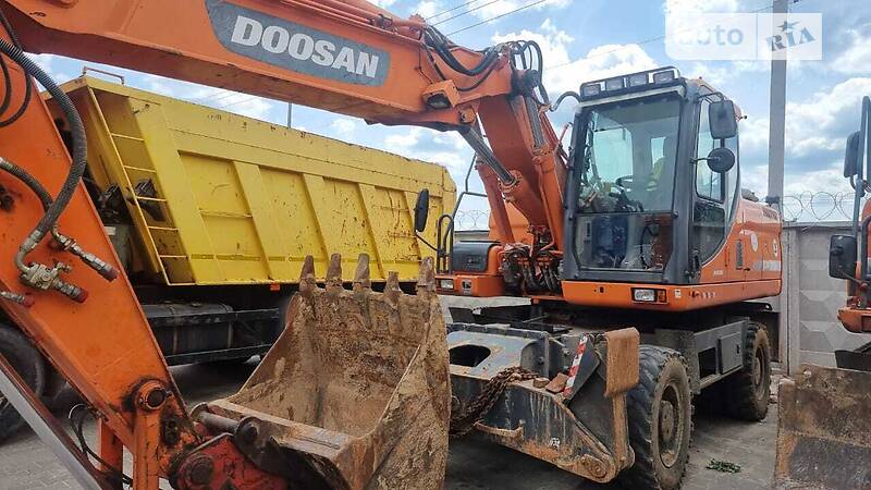Екскаватор навантажувач Doosan DX 2010 в 