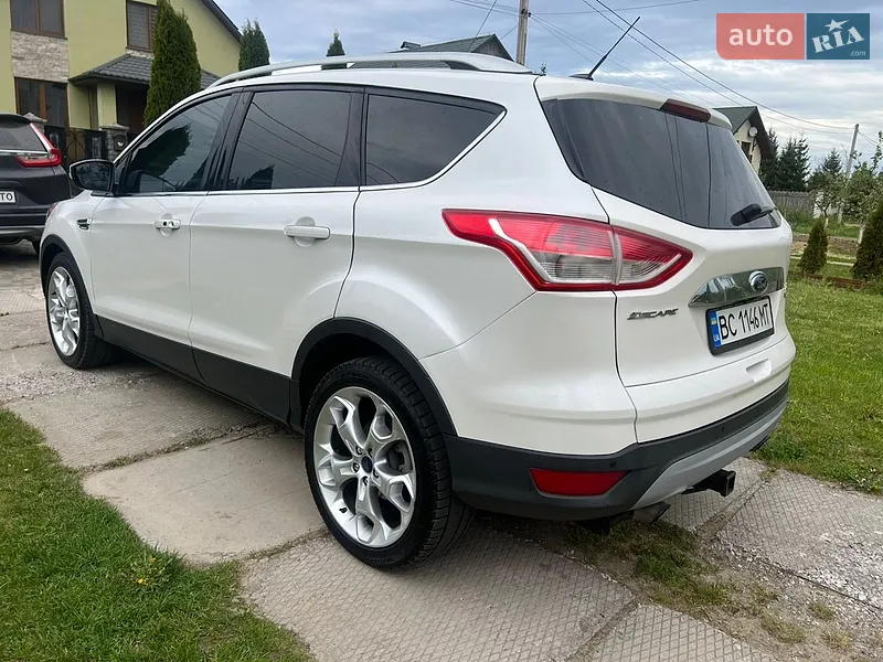 Ford Escape 2014 VIN 1FMCU0J99EUE56752 фото оголошення 5 з 55