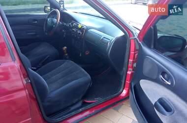 Хэтчбек Ford Escort 1998 в 