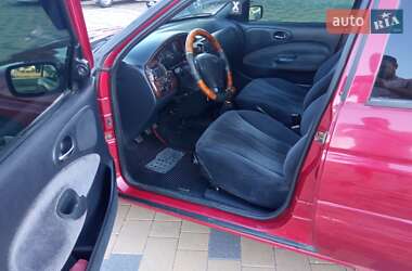 Хэтчбек Ford Escort 1998 в 