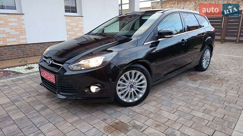 2011 Ford Focus, VIN WF0LXXGCBLBT06090:plate — фото 1 (autoria)