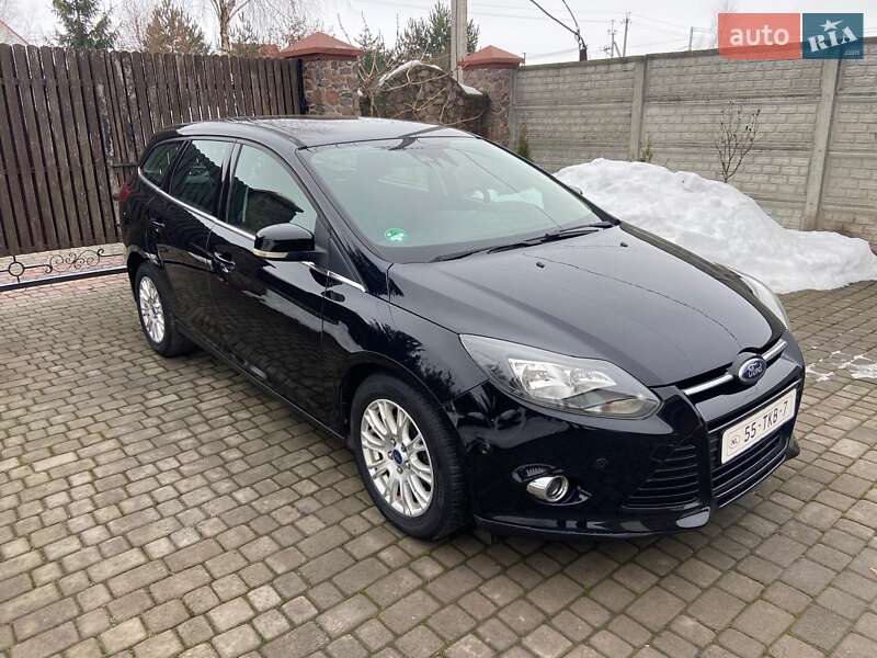 2012 Ford Focus, VIN WF0LXXGCBLCB76449:plate — фото 1 (autoria)