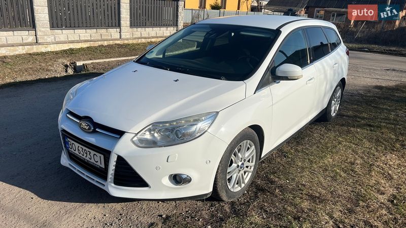 2012 Ford Focus, VIN WF0LXXGCBLCL40281:plate — фото 1 (autoria)