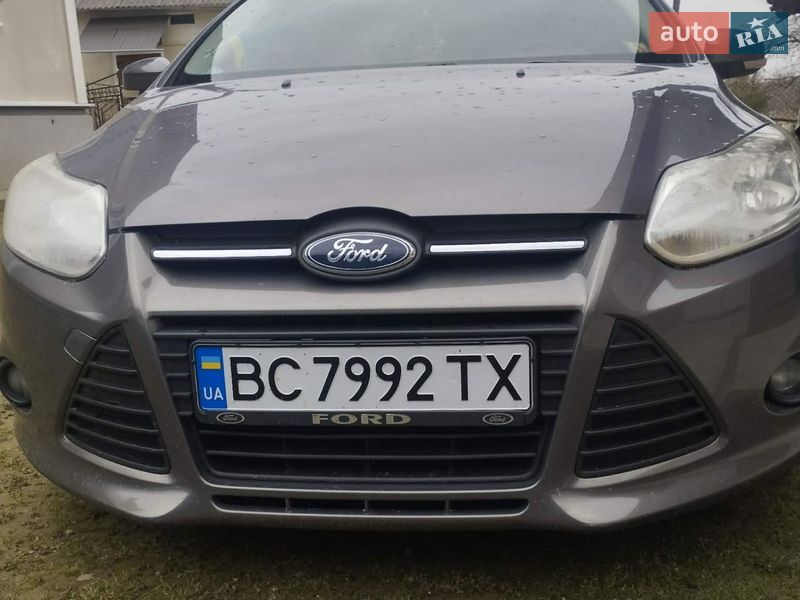 2011 Ford Focus, VIN WF0LXXGCBLBY43877:plate — фото 1 (autoria)