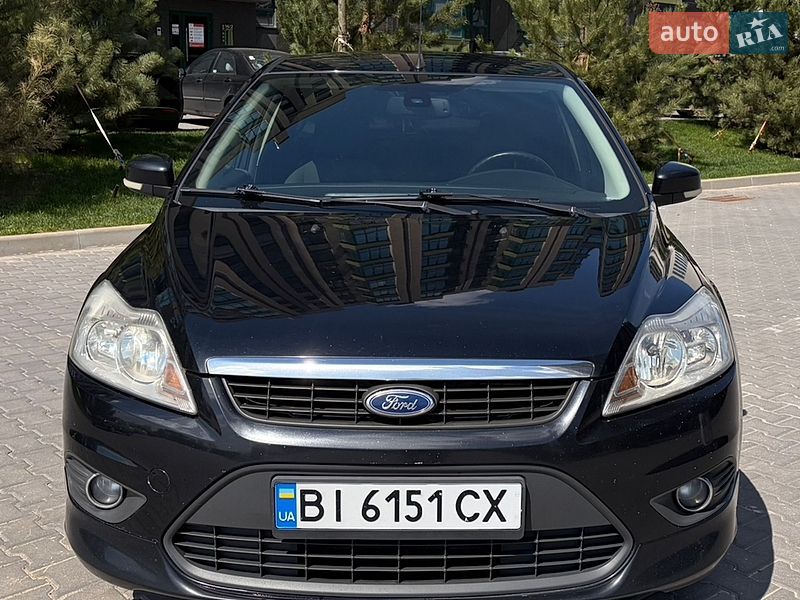 2008 Ford Focus, VIN WF0SXXGCDS8T14711:plate — фото 1 (autoria)