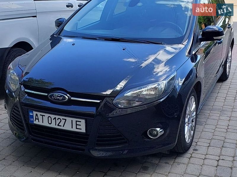 2011 Ford Focus, VIN WF0LXXGCBLBS57995:plate — фото 1 (autoria)
