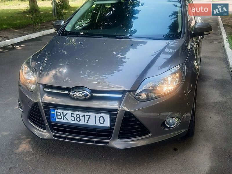 2013 Ford Focus, VIN WF0LXXGCBLDG45119:plate — фото 1 (autoria)