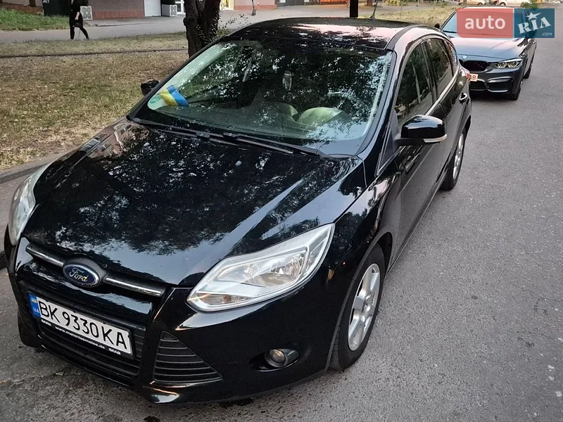 Ford Focus 2011 VIN WF0KXXGCBKBK72615 фото оголошення 15 з 77