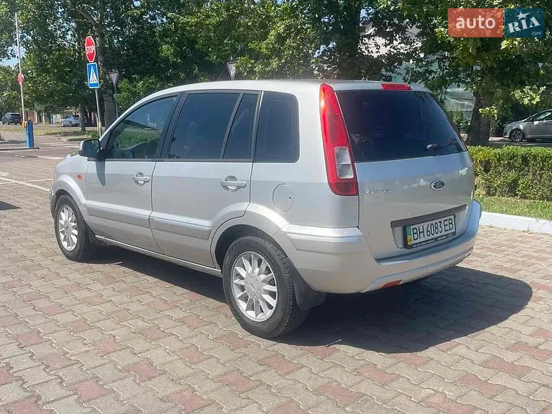 Ford Fusion 2011 VIN WF0UXXGAJUBT59415 фото оголошення 5 з 52