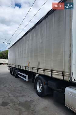 Бортовий напівпричіп Fruehauf FST4FC 2011 в Житомирі