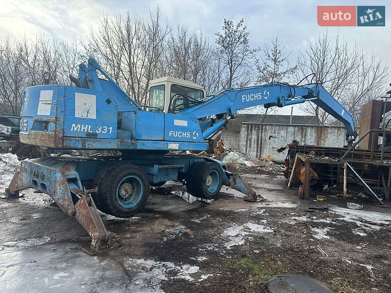 Экскаватор погрузчик Fuchs 331 1997 в Пирятине