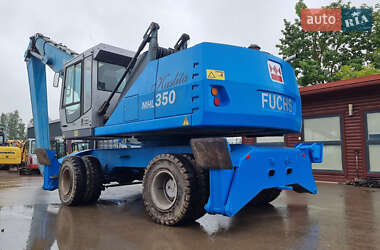 Экскаватор погрузчик Fuchs MHL-350 2010 в 