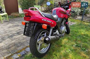Мотоцикл Без обтекателей (Naked bike) Honda CB 500 1998 в 