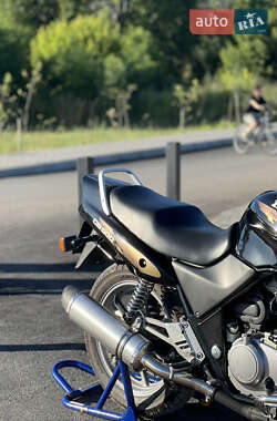 Мотоцикл Без обтекателей (Naked bike) Honda CB 500 1996 в 